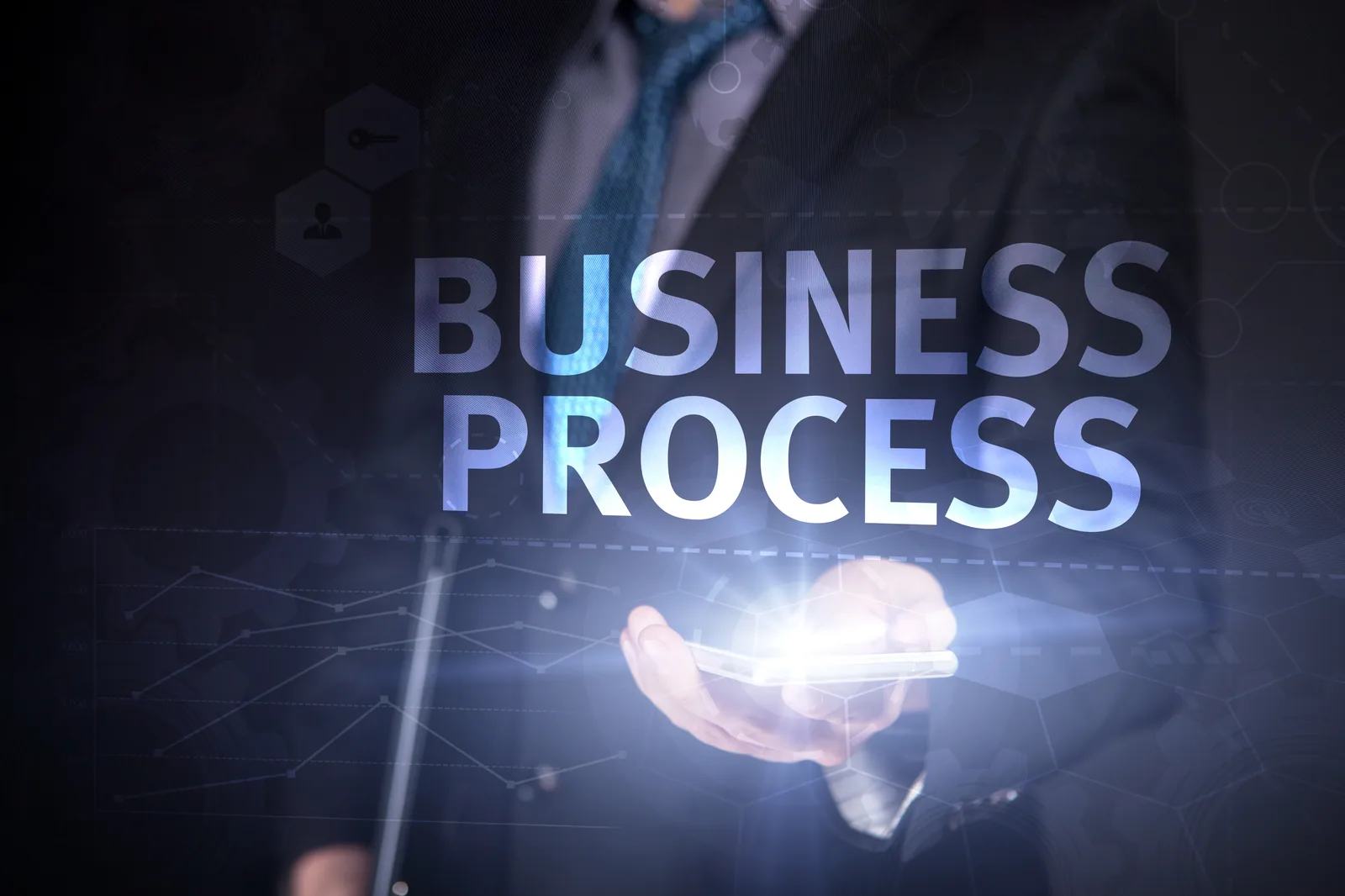Business process concept projected over a dark screen