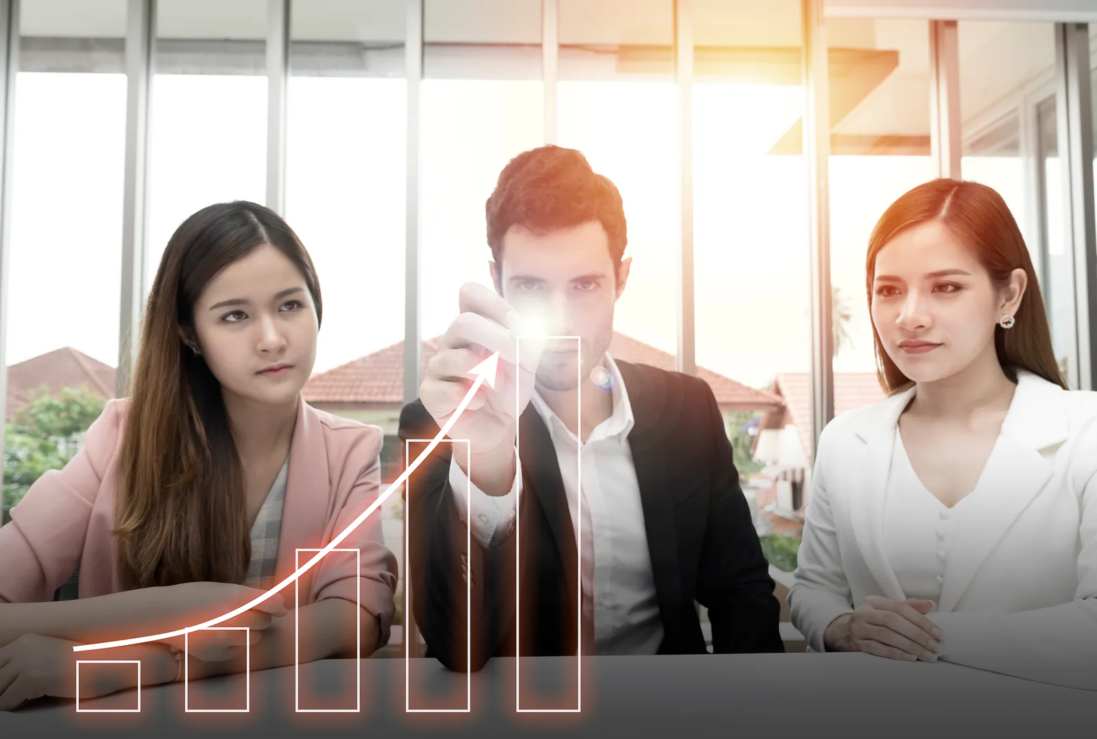Team plotting a rising growth curve in a strategy meeting